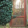 Door de tuinpoort eBook